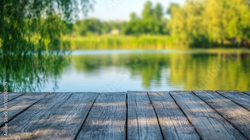 Fototapeta Naklejka Na Ścianę i Meble -  Serene lake view with rustic wooden table, natureinspired design and decor 