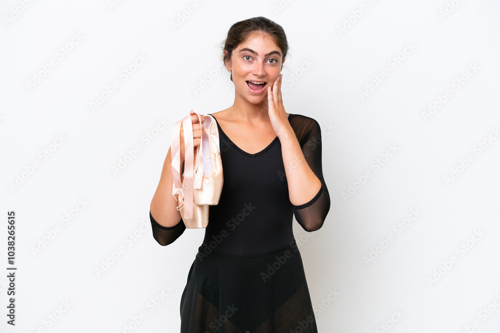 Young caucasian woman practicing ballet isolated on white background with surprise and shocked facial expression Young caucasian woman practicing ballet isolated on white background with surprise and shocked facial expression