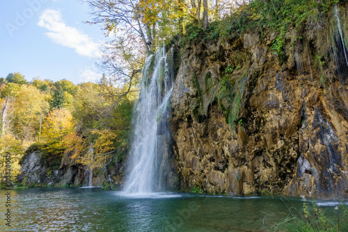 Waterfall in the woods at autumn season