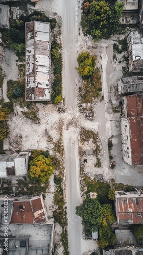 Drone photography capturing forgotten streets, merging modern decay with echoes of historical events, haunting beauty photo