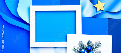 white frame on a bright blue background with festive decorations photo