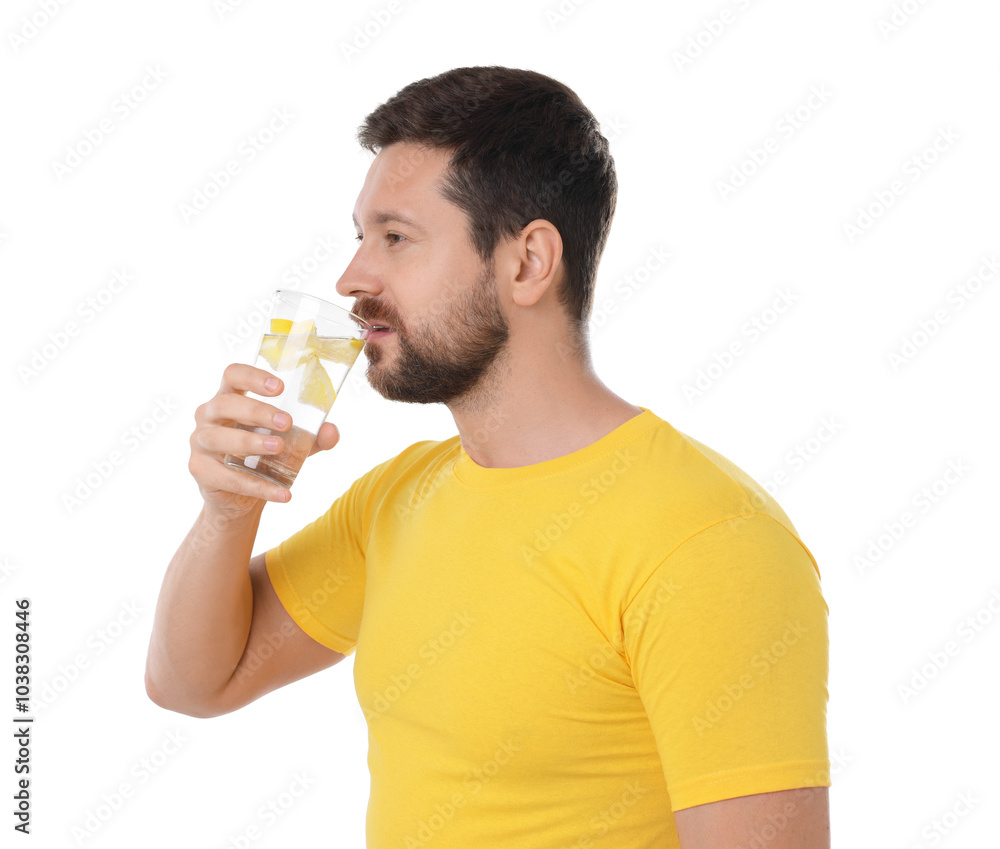 Handsome man drinking water with lemon on white background Handsome man drinking water with lemon on white background