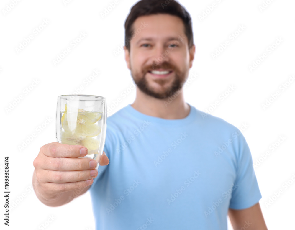 Happy man showing glass of water with lemon on white background, selective focus Happy man showing glass of water with lemon on white background, selective focus