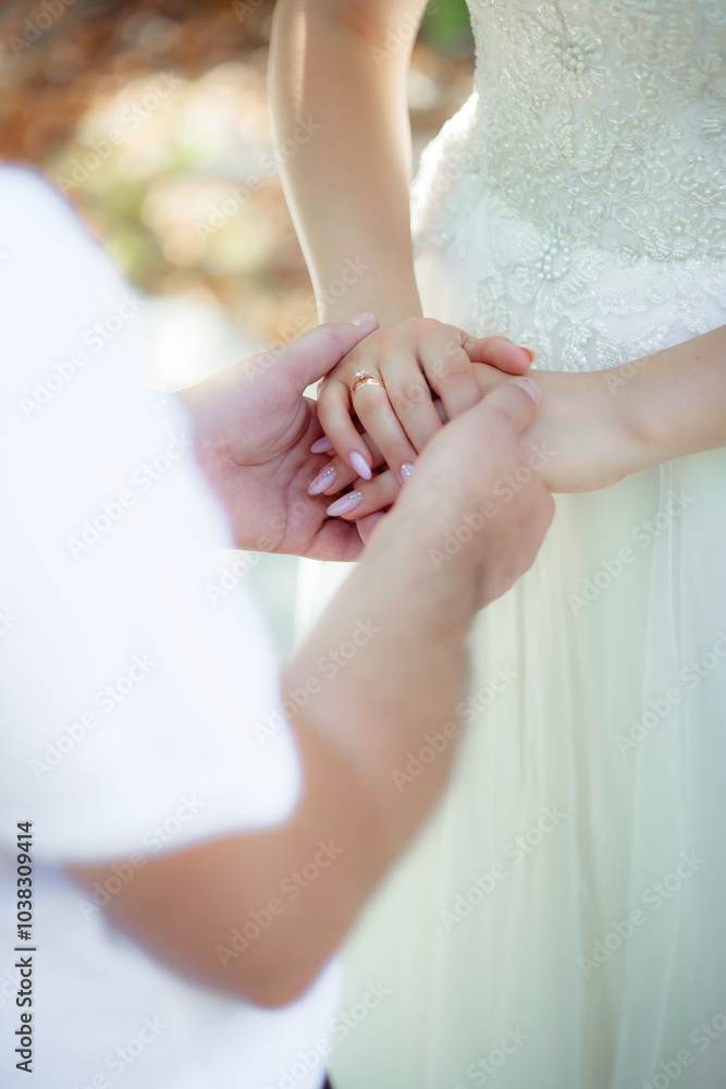 Newlyweds touch each other. A very subtle trust. Trust line. Relations between a man and a woman. The concept of nail and hand care. Newlyweds touch each other. A very subtle trust. Trust line. Relations between a man and a woman. The concept of nail and hand care.