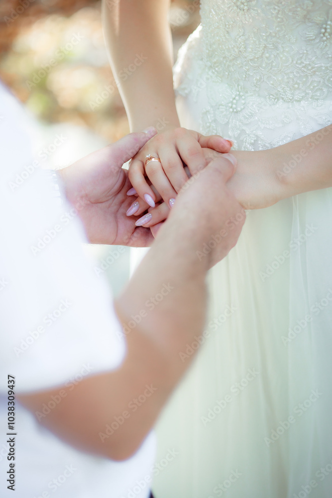 Newlyweds touch each other. A very subtle trust. Trust line. Relations between a man and a woman. The concept of nail and hand care. Newlyweds touch each other. A very subtle trust. Trust line. Relations between a man and a woman. The concept of nail and hand care.