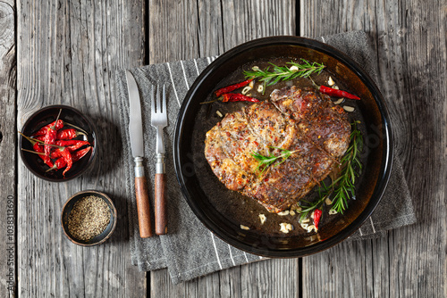 Juicy Roast Pork Neck on table, top view