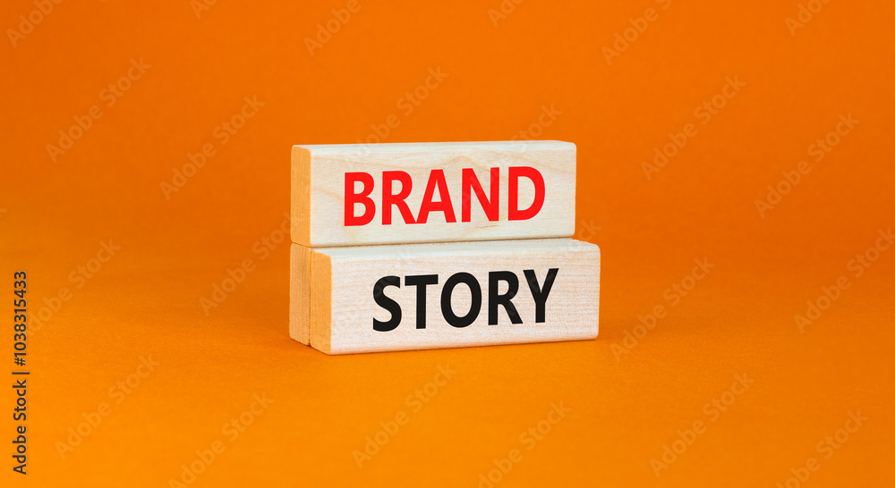 Brand story branding symbol. Concept words Brand story on beautiful wooden blocks. Beautiful orange background. Business brand story branding concept. Copy space. Brand story branding symbol. Concept words Brand story on beautiful wooden blocks. Beautiful orange background. Business brand story branding concept. Copy space.