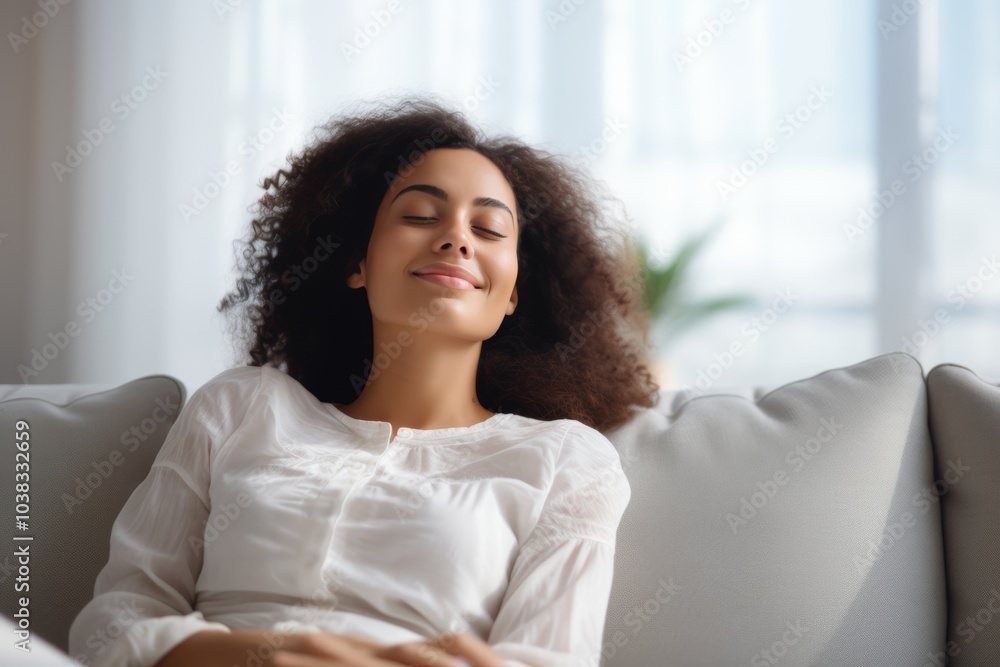 Sweet idleness. Lazy young hispanic lady sit in relaxed pose on big comfy sofa at living room interior breath air dream imagine. Successful female new flat apartment buyer rest at home feel pleasure Sweet idleness. Lazy young hispanic lady sit in relaxed pose on big comfy sofa at living room interior breath air dream imagine. Successful female new flat apartment buyer rest at home feel pleasure