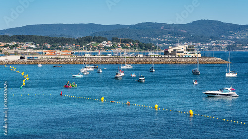 Wallpaper Mural Sanjenjo, Spain, August 15, 2024: Silgar Beach packed with tourists on a sunny day in the Ria de Pontevedra, Galicia. Torontodigital.ca