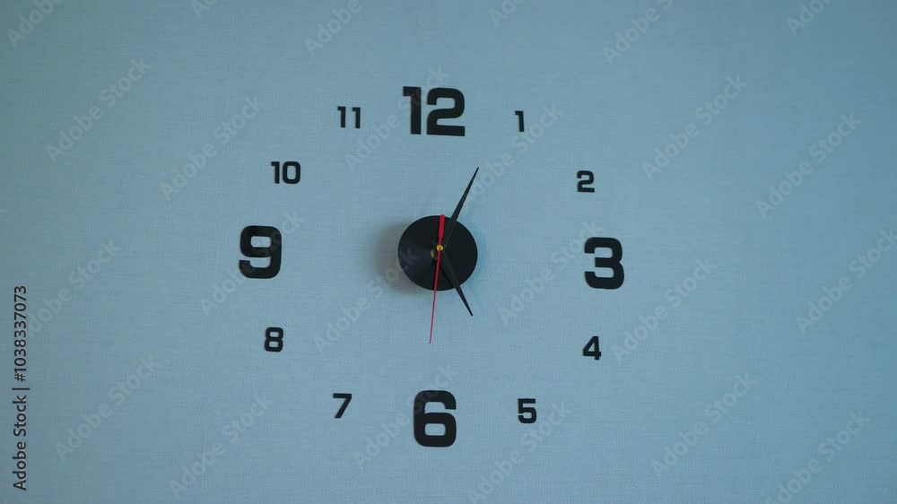 A minimalist clock, a silent observer of the passing hours. A simple clock face, marking the passage of time. A quiet, precise moment captured on a light blue wall. The hands of time, subtly pointing A minimalist clock, a silent observer of the passing hours. A simple clock face, marking the passage of time. A quiet, precise moment captured on a light blue wall. The hands of time, subtly pointing