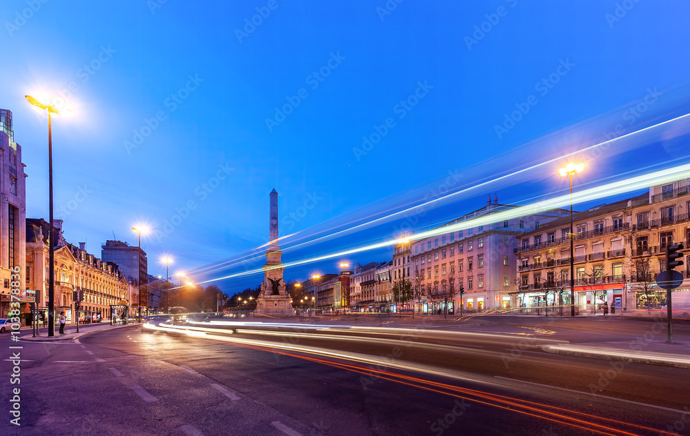 Fototapeta premium Nighttime Light Trails at Restauradores Square in Lisbon, Portugal
