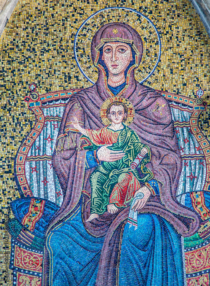 Captivating mosaic of Madonna with child under Torre dell'Orologio in Taormina, Italy, showcasing intricate artistry and religious significance Captivating mosaic of Madonna with child under Torre dell'Orologio in Taormina, Italy, showcasing intricate artistry and religious significance