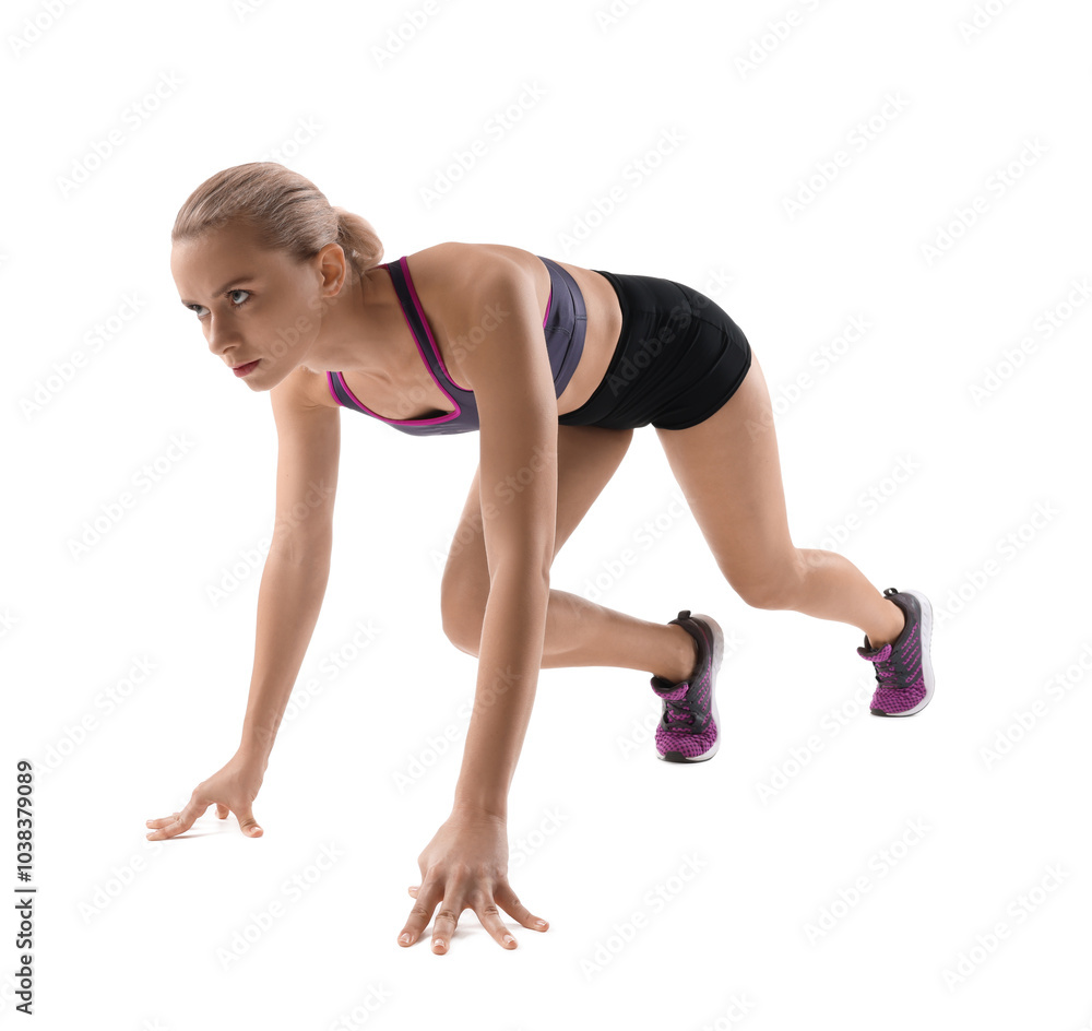 Runner in starting position on white background Runner in starting position on white background