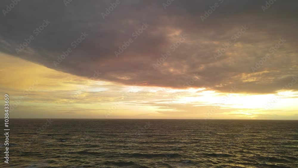 Aerial view Dramatic sunset over storm clouds. Beautiful red color sky. Red purple orange blue pink sunset cloud background. Concept holiday in the tropics Aerial view Dramatic sunset over storm clouds. Beautiful red color sky. Red purple orange blue pink sunset cloud background. Concept holiday in the tropics
