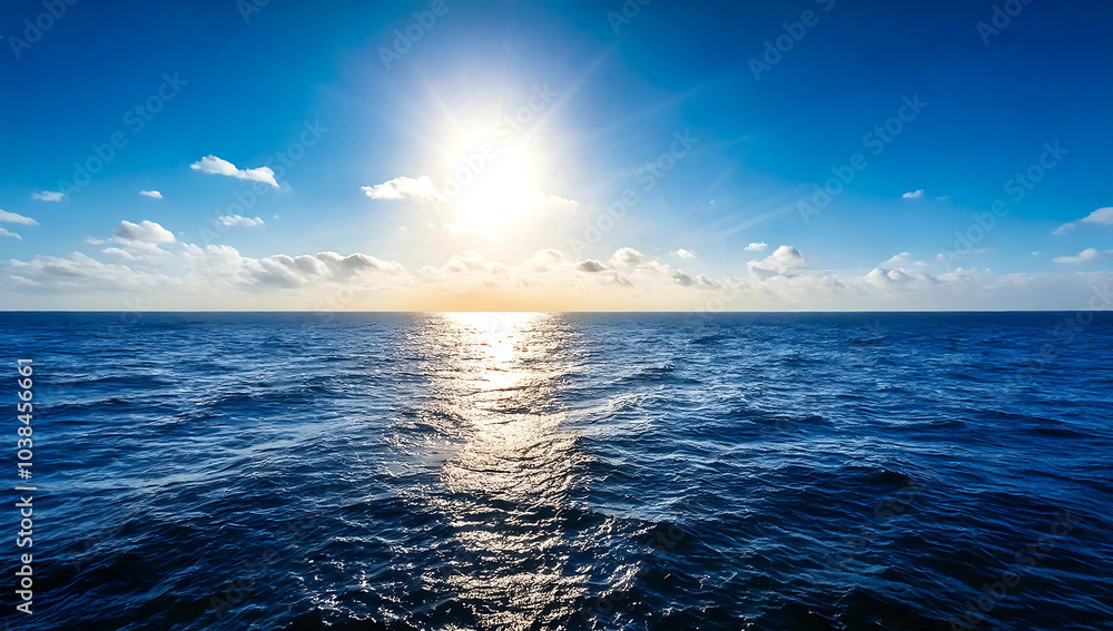 Fototapeta premium Panorama of the blue ocean with reflections of the sun. vast open sea ripples and the calm sea with beautiful sunshine and sunsets.