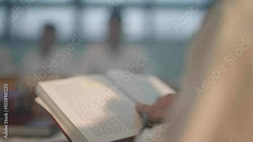 Jewish books reading turning pages of Torah