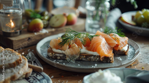 A minimalist Scandinavian table setting with open-faced sandwiches topped with fresh fish, dill, and pickled vegetables.