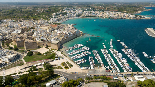 Aerial view of the castle, the Norman cathedral and port in the historic center of Otranto in the province of Lecce, Salento, Puglia. Located on the Adriatic Sea, it is the easternmost city in Italy. photo