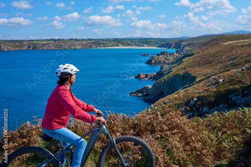 active senior woman cycling...