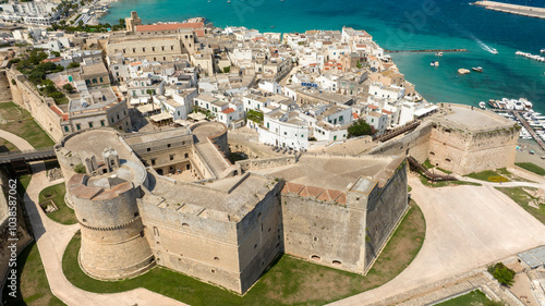 Fototapeta Naklejka Na Ścianę i Meble -  Panoramic aerial view of the castle and Norman cathedral in the historic center of Otranto in the province of Lecce, Salento, Puglia. Located on the Adriatic Sea, it is the easternmost city in Italy.
