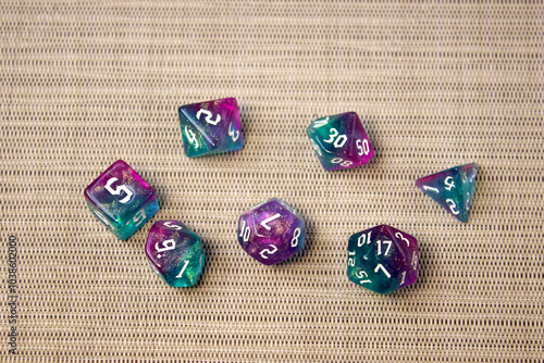 Set of dice for fantasy dnd and rpg tabletop games Board game polyhedral dices with different sides on wooden background