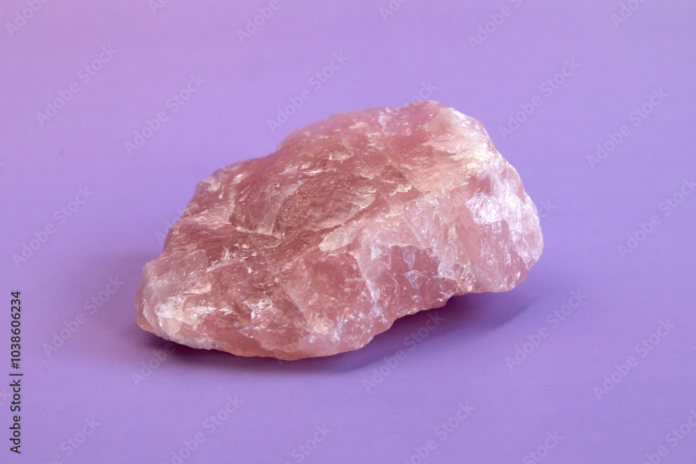 Piece of polished pink quartz as nice background. Minimal color still life Narrow focus line, shallow depth of field Piece of polished pink quartz as nice background. Minimal color still life Narrow focus line, shallow depth of field