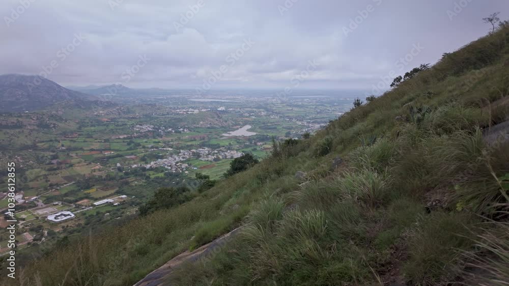 Aerial View of the Nandi Valley in India from the Nandi Hills with Cloudy skies Aerial View of the Nandi Valley in India from the Nandi Hills with Cloudy skies