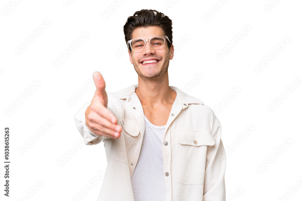 Young handsome caucasian man over isolated background shaking hands for closing a good deal Young handsome caucasian man over isolated background shaking hands for closing a good deal
