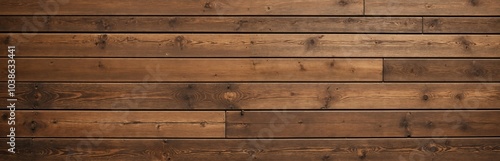 A wooden wall with a horizontal, light brown grain pattern, featuring 24 vertical slats, is captured from a low angle, emphasizing its rustic charm and contrast against a light brown background