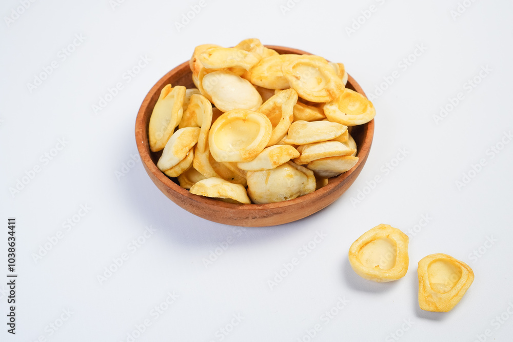 A bowl of food with many pieces of food in it A bowl of food with many pieces of food in it