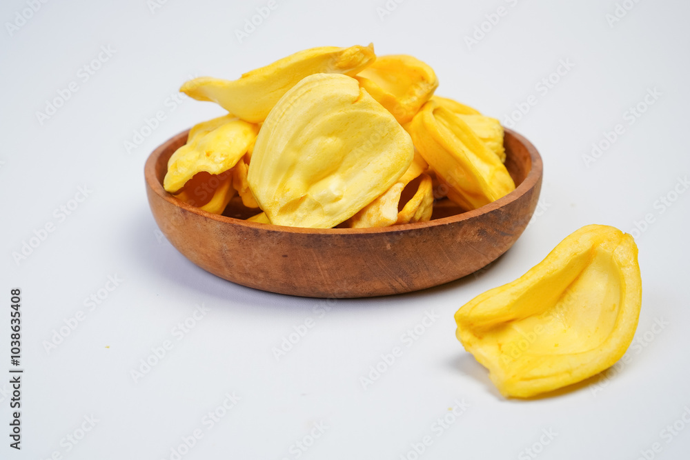 A bowl of yellow pieces of fruit A bowl of yellow pieces of fruit