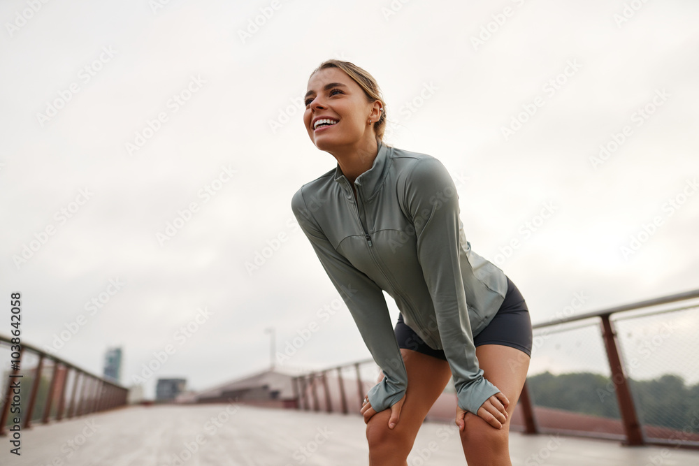 custom made wallpaper toronto digitalA Smiling Young Woman Taking a WellDeserved Break After Running Outdoors in Nature