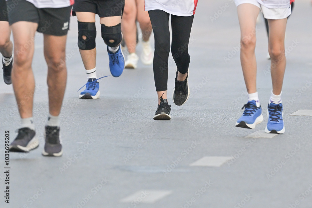 Fitness and sport man running in outdoor by training, exercise and practice for marathon competition of cardio health.Athlete as runner together for performance progress goal Fitness and sport man running in outdoor by training, exercise and practice for marathon competition of cardio health.Athlete as runner together for performance progress goal