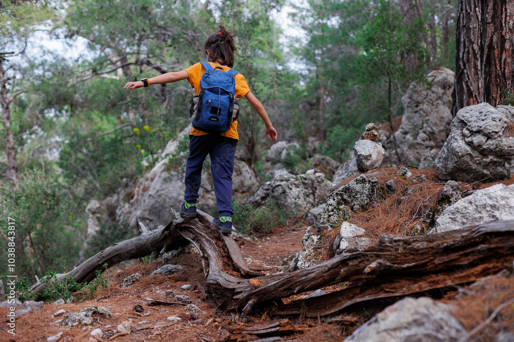 summer camp. happy boy with a backpack explores the summer forest. trekking and hiking. summer camp. happy boy with a backpack explores the summer forest. trekking and hiking.