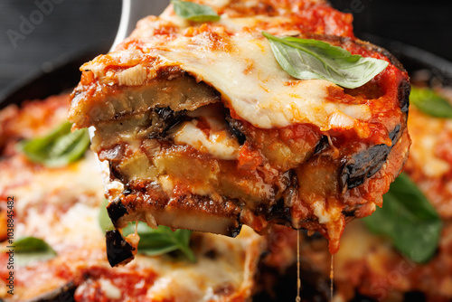 Traditional homemade Aubergine parmigiana with tomato sauce parmesan and mozzarella cheese