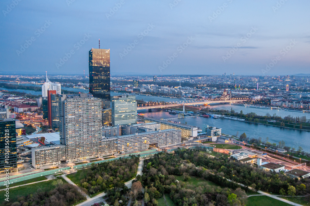 Obraz premium stunning aerial perspective of Vienna with the Danube River winding through the city, Austria