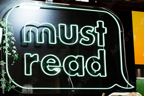 illuminated must read neon sign