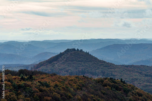 Serene Mountainscape at Dusk with Vibrant and Lush Autumn Foliage in Spectacular Display