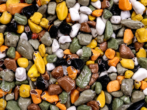 confectionery decor in the form of small stones. dragee pebbles multicolored