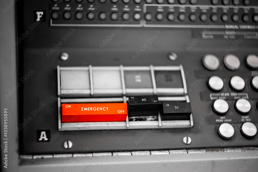Red emergency switch in military control panel Red emergency switch in military control panel