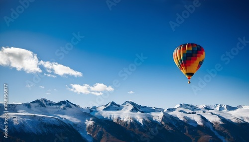 A Hot Air Balloon flying over the mountains