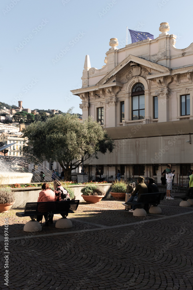 Fototapeta premium Ingresso della stazione marittima MSC al porto di Genova(Liguria), le persone sono sedute in attesta dell imbarco 