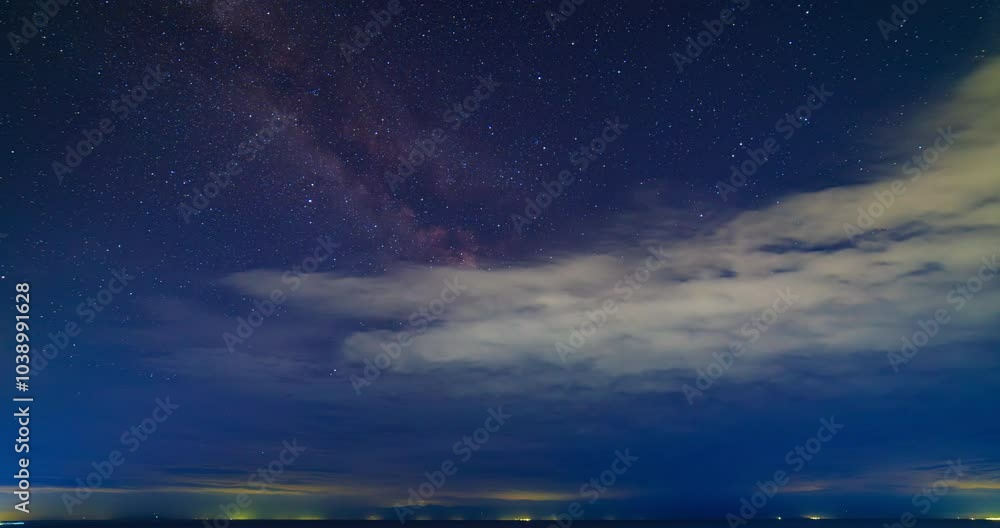 starry sky with thin clouds at summer night, time lapse. starry sky with thin clouds at summer night, time lapse.