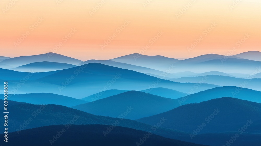 Obraz premium A mountain range viewed from a hilltop during sunset