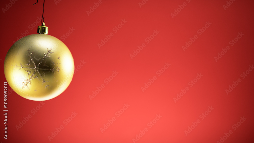 Christmas gold ball with red background Christmas gold ball with red background