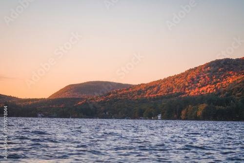 Autumn Mountains at sunrise on the lake