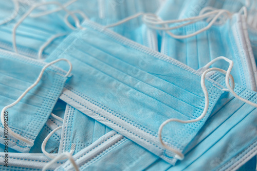 Obraz na płótnie Many sterile medical blue disposable masks. Stack of new medical masks organized. w salonie