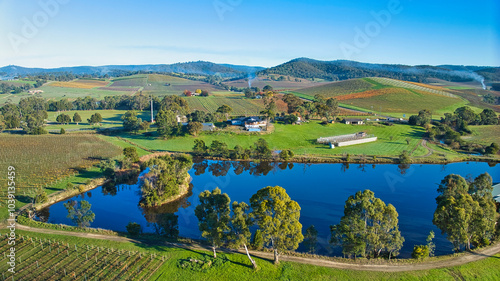 A dam in the Yarra Valley near Yarra Glen showing reflections of trees photo