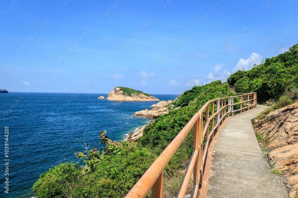 Scenic Coastal Pathway Leading to Ocean View with Steps and Lush Greenery, Po Toi Island, Hong Kong Scenic Coastal Pathway Leading to Ocean View with Steps and Lush Greenery, Po Toi Island, Hong Kong