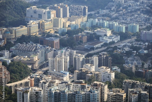 Expansive Skyline of Kowloon Peninsula with Dense High-Rise Buildings and Distant Harbor View, Hong Kong photo